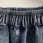 Pantalon en denim usé épissé avec patch vintage pour femmes
