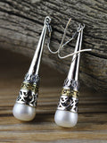 Boucles d'oreilles ethniques en perles sculptées en argent pour femmes
